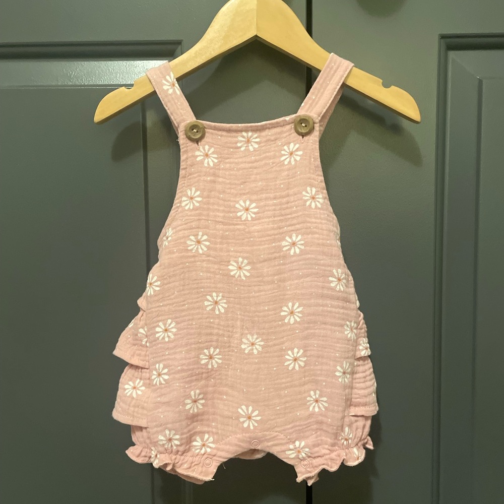 Pink romper with white flowers never been worn! Size 12 months.